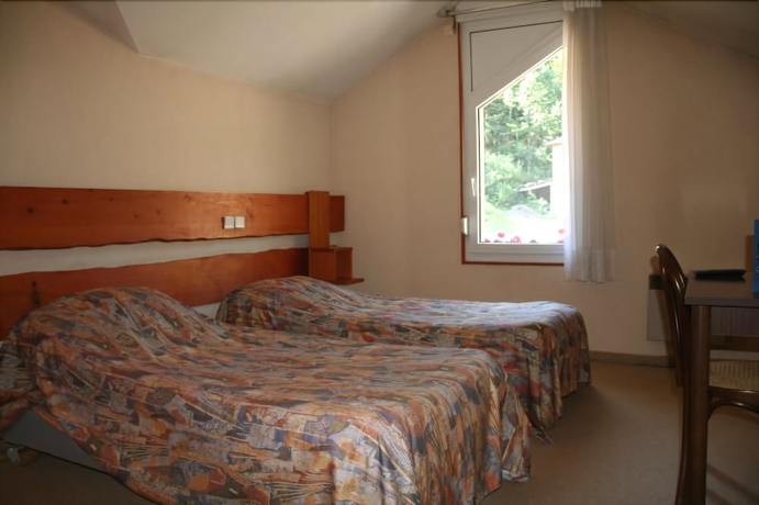 Imagen de la habitación del Hotel De La Grande Cascade. Foto 16