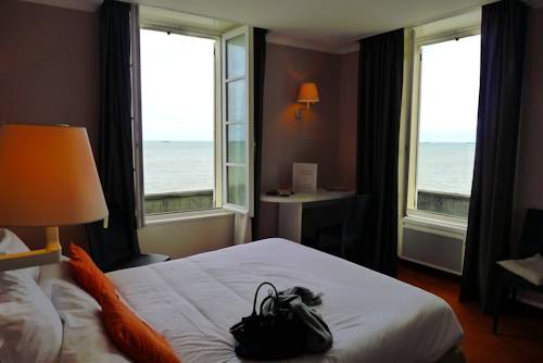 Imagen de la habitación del Hotel De La Marine, Arromanches les Bains. Foto 3