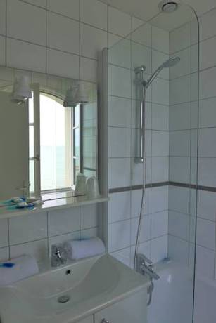 Imagen de la habitación del Hotel De La Marine, Arromanches les Bains. Foto 6
