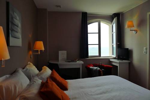 Imagen de la habitación del Hotel De La Marine, Arromanches les Bains. Foto 7
