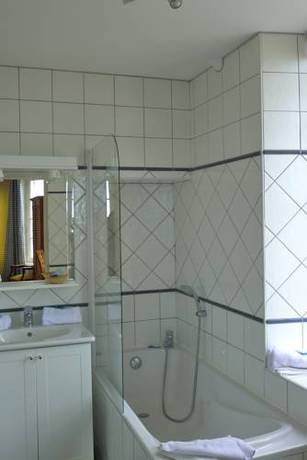 Imagen de la habitación del Hotel De La Marine, Arromanches les Bains. Foto 9