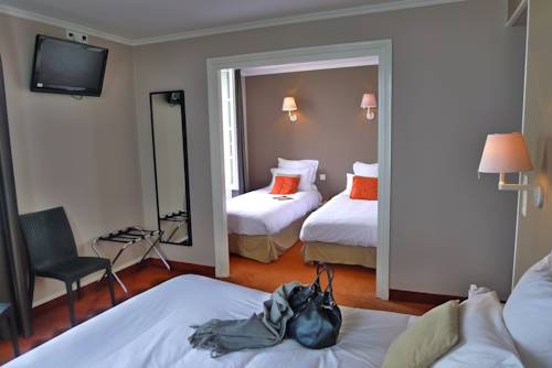 Imagen de la habitación del Hotel De La Marine, Arromanches les Bains. Foto 10