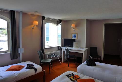 Imagen de la habitación del Hotel De La Marine, Arromanches les Bains. Foto 12