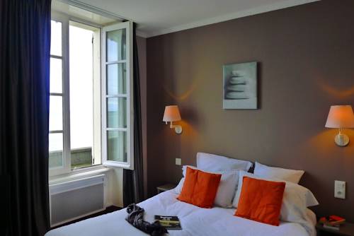 Imagen de la habitación del Hotel De La Marine, Arromanches les Bains. Foto 14