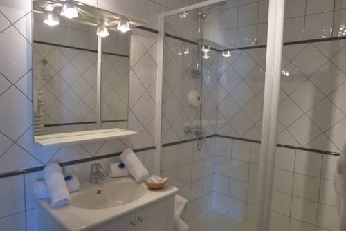 Imagen de la habitación del Hotel De La Marine, Arromanches les Bains. Foto 16