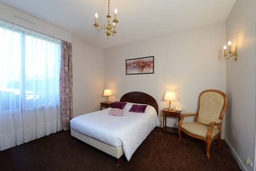 Imagen de la habitación del Hotel De La Marine. Foto 8