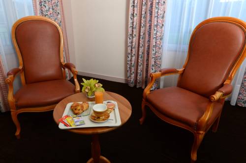 Imagen de la habitación del Hotel De La Marine. Foto 14