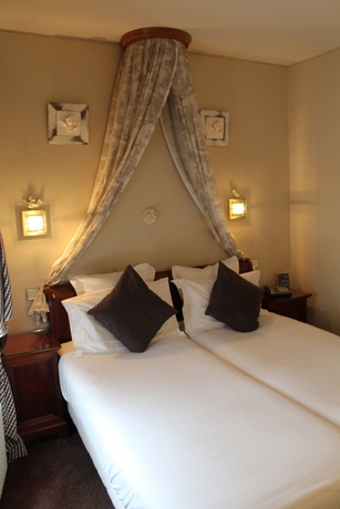 Imagen de la habitación del Hotel De La Motte Picquet. Foto 4