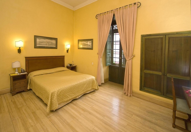 Imagen de la habitación del Hotel De La Opera. Foto 11