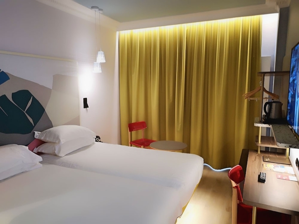 Imagen de la habitación del Hotel De La Paix, París. Foto 3