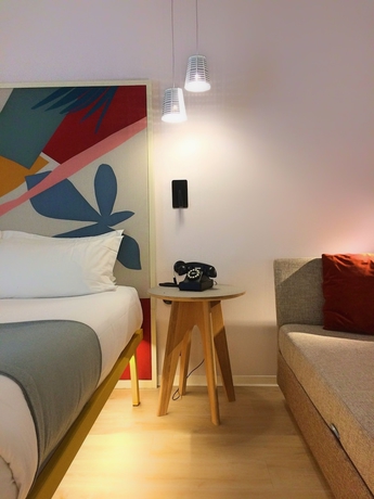 Imagen de la habitación del Hotel De La Paix, París. Foto 6
