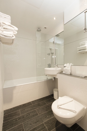 Imagen de la habitación del Hotel De La Paix, París. Foto 17