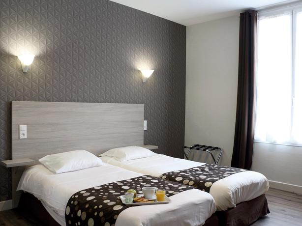 Imagen de la habitación del Hotel De La Place, Aunay-sur-Odon. Foto 5