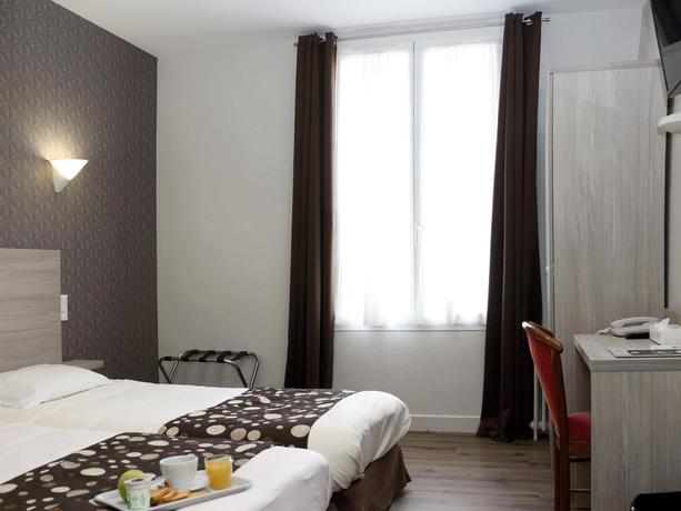 Imagen de la habitación del Hotel De La Place, Aunay-sur-Odon. Foto 7