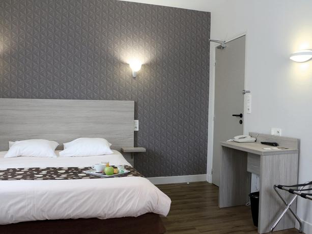 Imagen de la habitación del Hotel De La Place, Aunay-sur-Odon. Foto 8