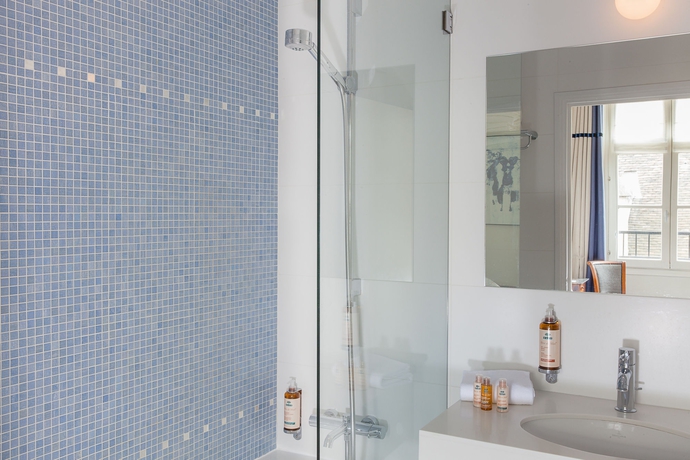 Imagen de la habitación del Hotel De La Place Du Louvre. Foto 7