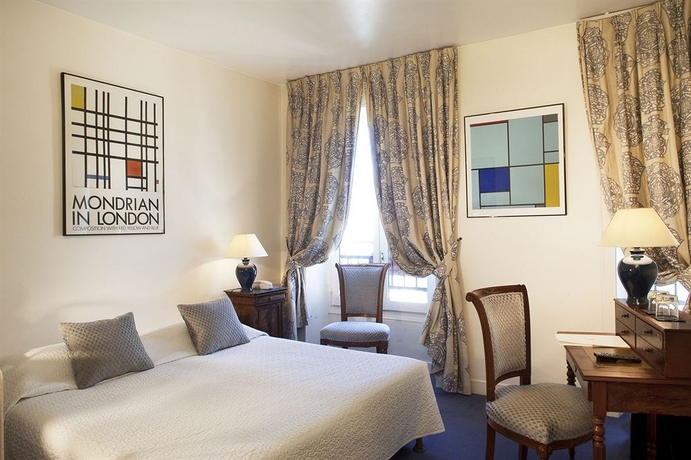 Imagen de la habitación del Hotel De La Place Du Louvre. Foto 12
