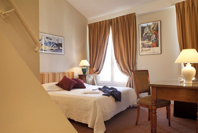 Imagen de la habitación del Hotel De La Place Du Louvre. Foto 13