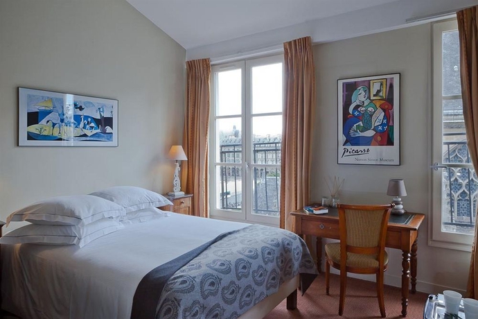Imagen de la habitación del Hotel De La Place Du Louvre. Foto 14