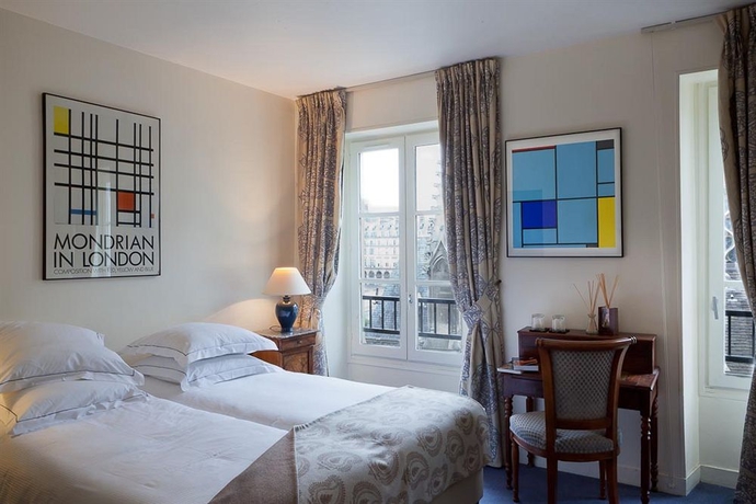 Imagen de la habitación del Hotel De La Place Du Louvre. Foto 15