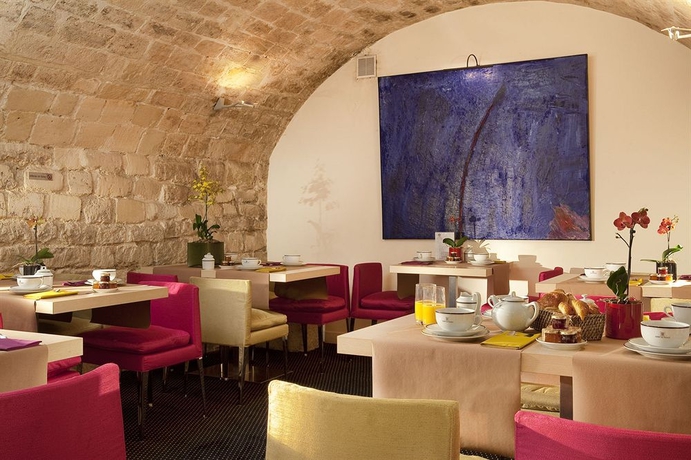 Imagen del bar/restaurante del Hotel De La Place Du Louvre. Foto 5