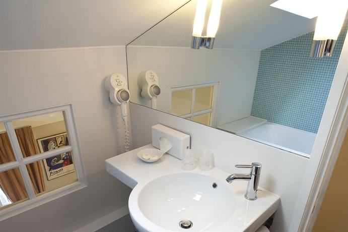 Imagen de la habitación del Hotel De La Place Du Louvre. Foto 16