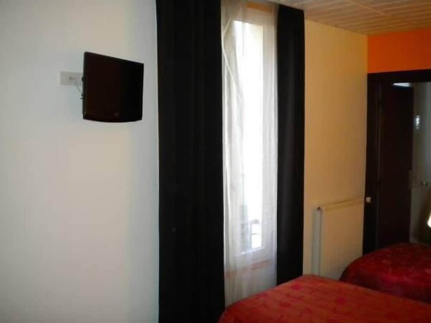 Imagen de la habitación del Hotel De La Place, Malakoff. Foto 2