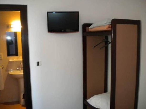 Imagen de la habitación del Hotel De La Place, Malakoff. Foto 3