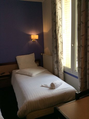 Imagen de la habitación del Hotel De La Place, Malakoff. Foto 6