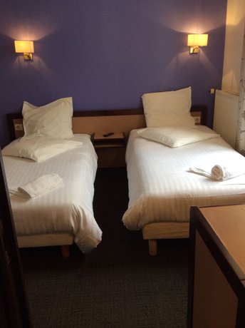 Imagen de la habitación del Hotel De La Place, Malakoff. Foto 8