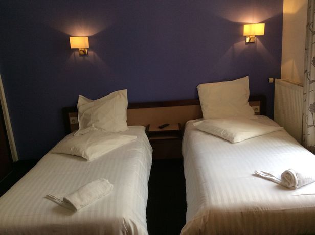 Imagen de la habitación del Hotel De La Place, Malakoff. Foto 14