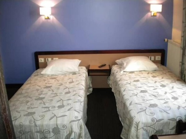 Imagen de la habitación del Hotel De La Place, Malakoff. Foto 18