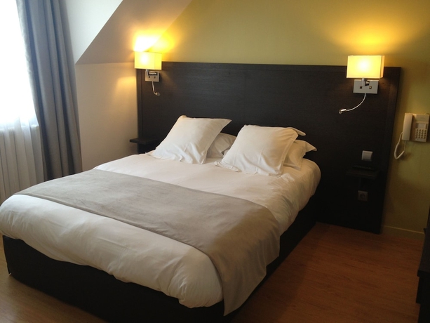 Imagen de la habitación del Hotel De La Plage, DINARD. Foto 11