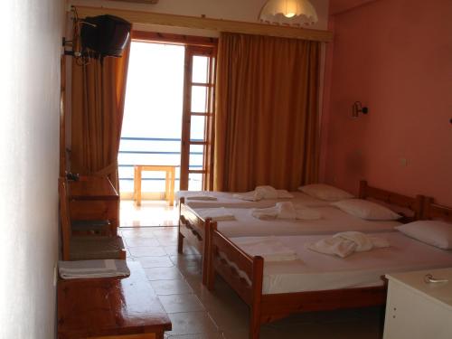 Imagen de la habitación del Hotel De La Plage Koroni. Foto 7