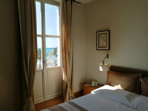 Imagen de la habitación del Hotel De La Plage, Pietra Ligure. Foto 3