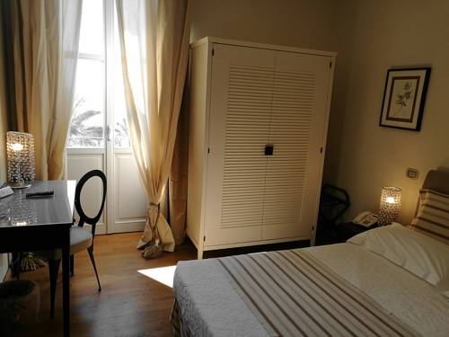 Imagen de la habitación del Hotel De La Plage, Pietra Ligure. Foto 14