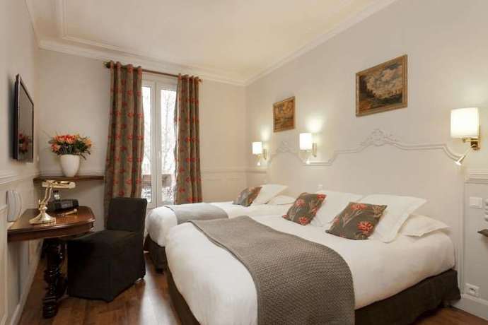 Imagen de la habitación del Hotel De La Porte Dorée. Foto 7