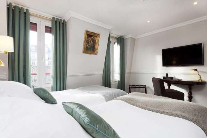 Imagen de la habitación del Hotel De La Porte Dorée. Foto 9