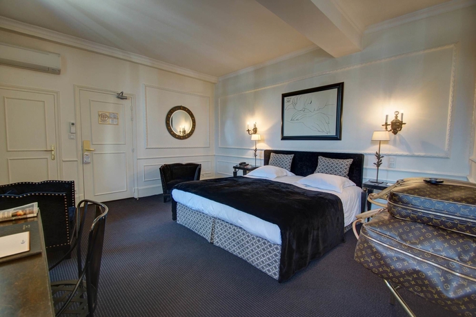 Imagen de la habitación del Hotel De La Poste, Beaune. Foto 5