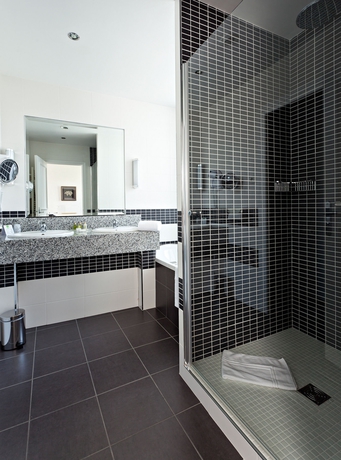 Imagen de la habitación del Hotel De La Poste, Beaune. Foto 8