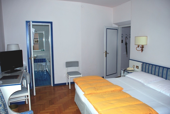 Imagen de la habitación del Hotel De La Poste, Cortina d'Ampezzo . Foto 6