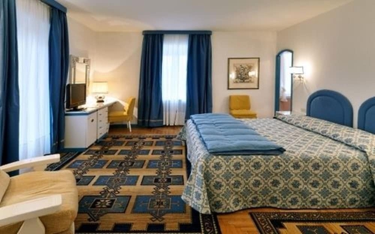 Imagen de la habitación del Hotel De La Poste, Cortina d'Ampezzo . Foto 7