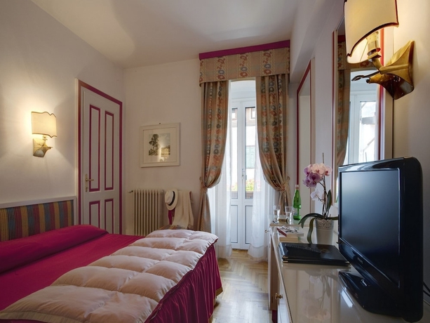 Imagen de la habitación del Hotel De La Poste, Cortina d'Ampezzo . Foto 9