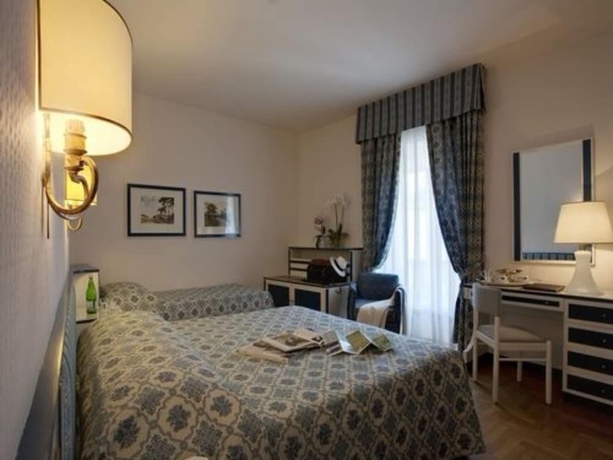 Imagen de la habitación del Hotel De La Poste, Cortina d'Ampezzo . Foto 11