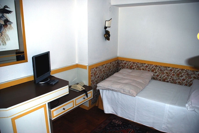 Imagen de la habitación del Hotel De La Poste, Cortina d'Ampezzo . Foto 15