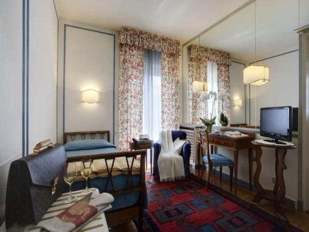 Imagen de la habitación del Hotel De La Poste, Cortina d'Ampezzo . Foto 16