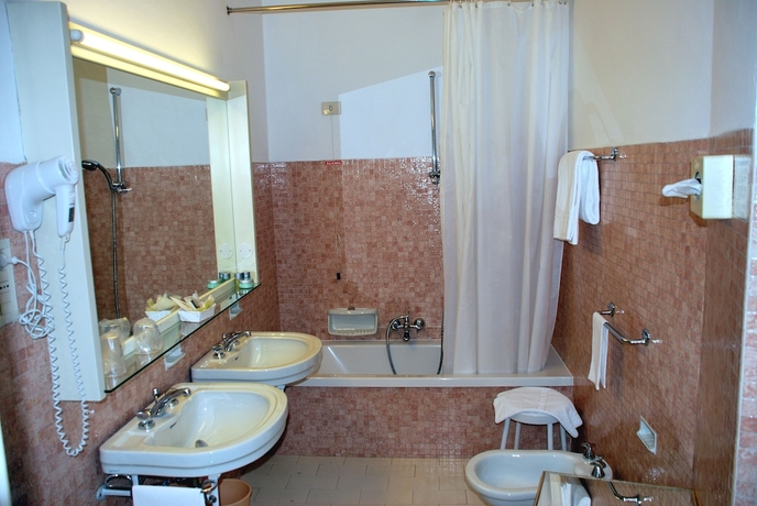 Imagen de la habitación del Hotel De La Poste, Cortina d'Ampezzo . Foto 19