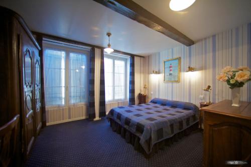 Imagen de la habitación del Hotel De La Poste, Langres. Foto 7