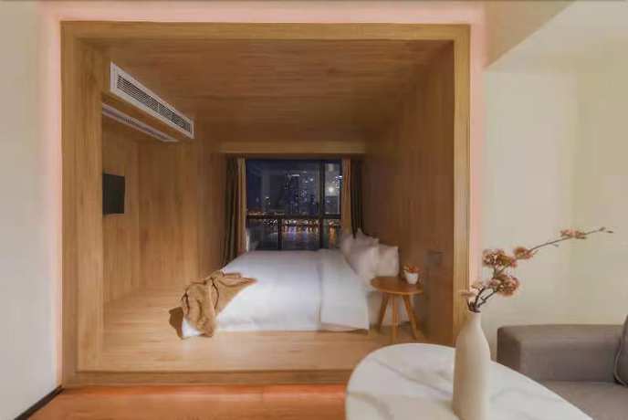 Imagen de la habitación del Hotel De La Reine Bar and Spa Guangzhou. Foto 11