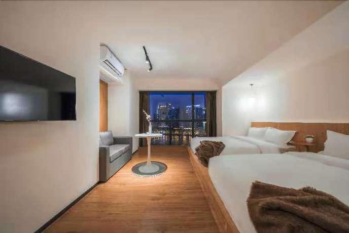 Imagen de la habitación del Hotel De La Reine Bar and Spa Guangzhou. Foto 12